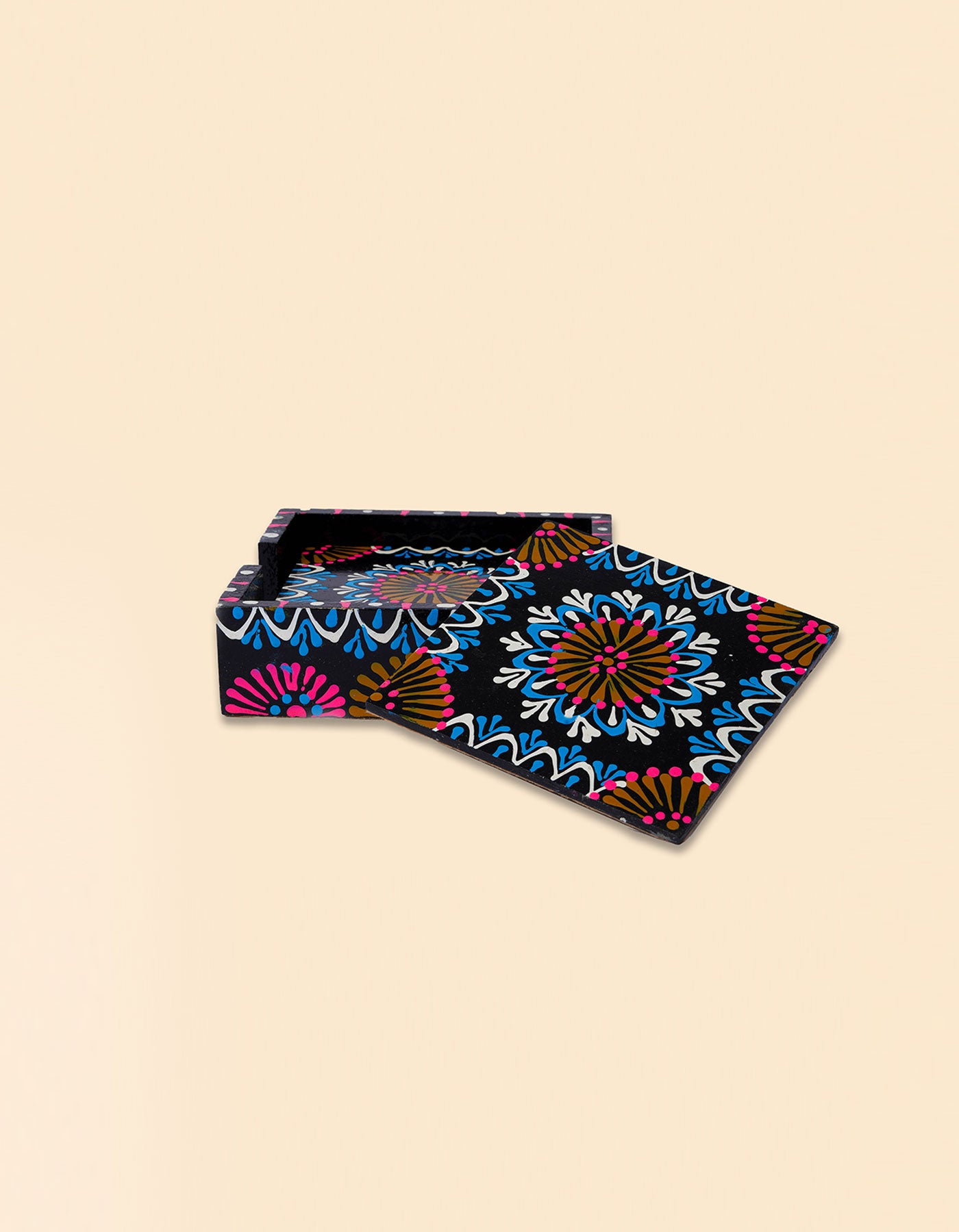 Colorful patterned box on a beige background