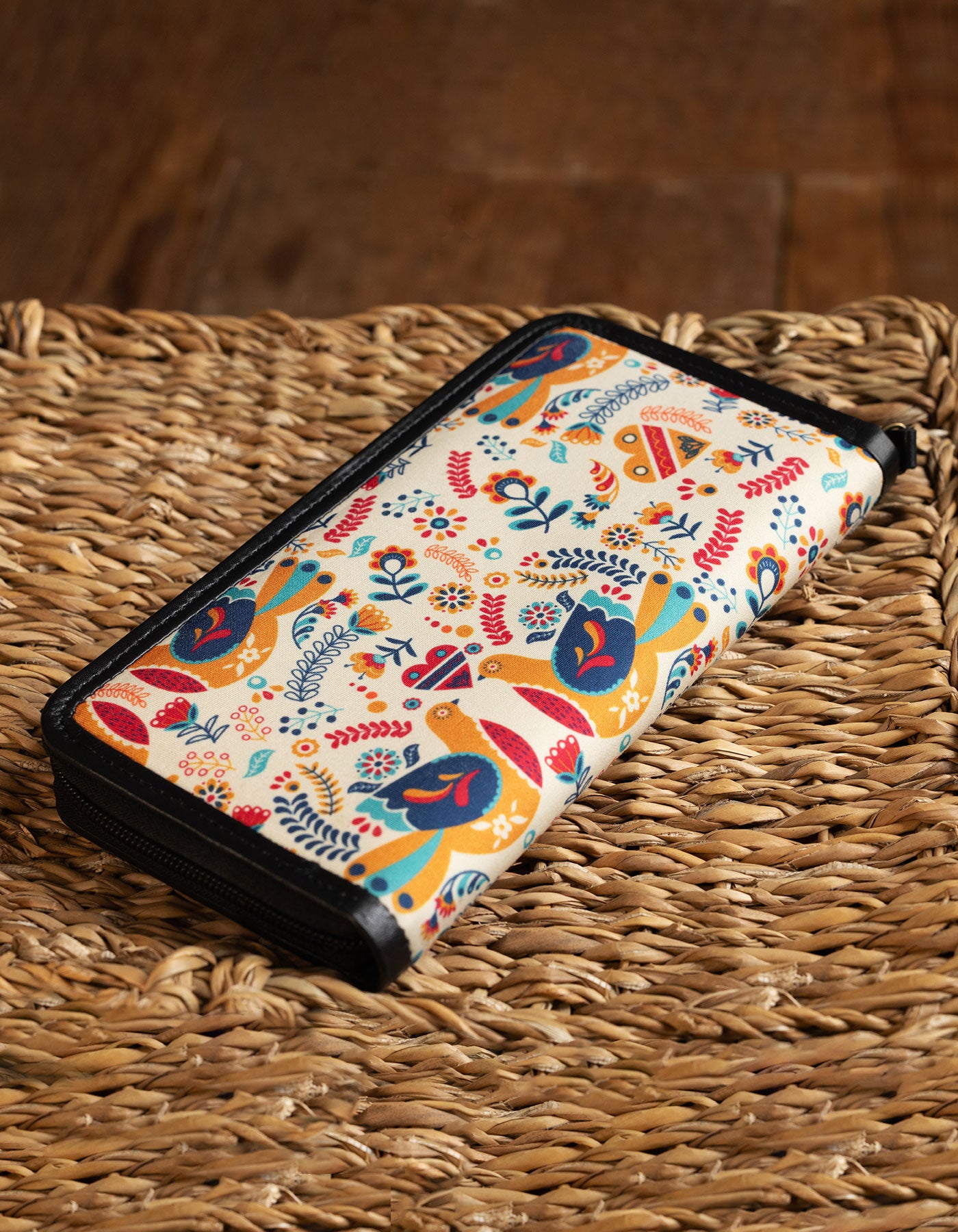 Colorful patterned phone case on a woven surface
