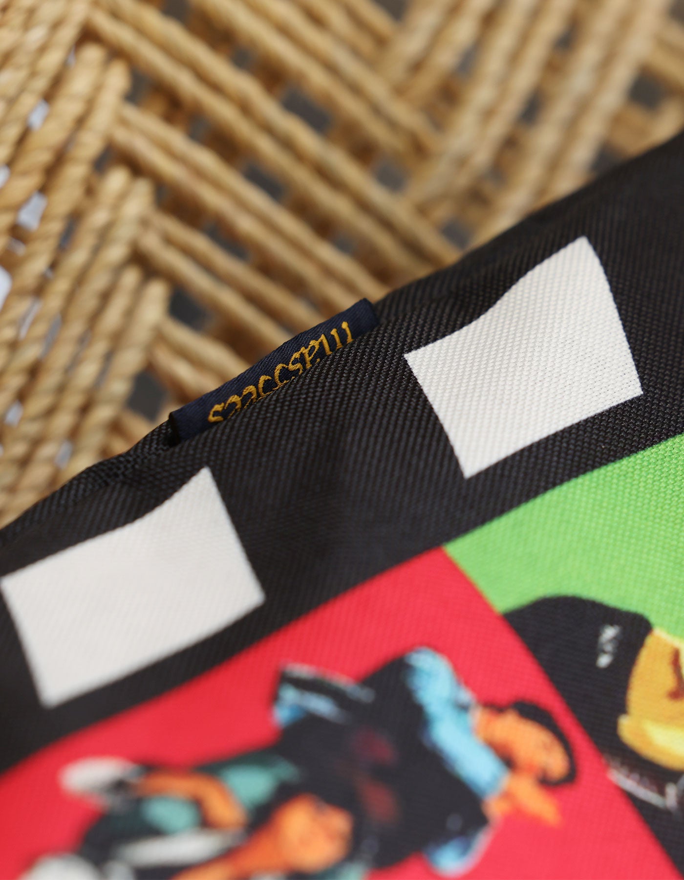 Close-up of a product with a brand label on a textured surface