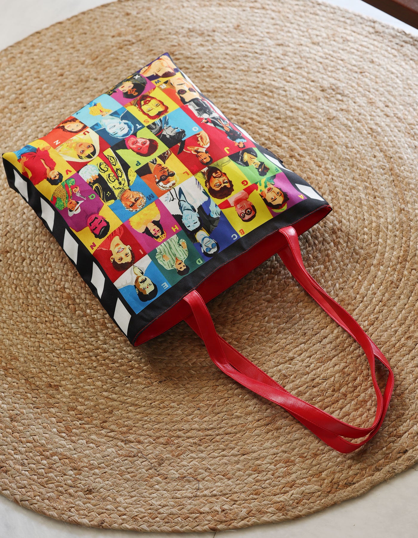 Colorful bag with cartoon characters on a woven mat