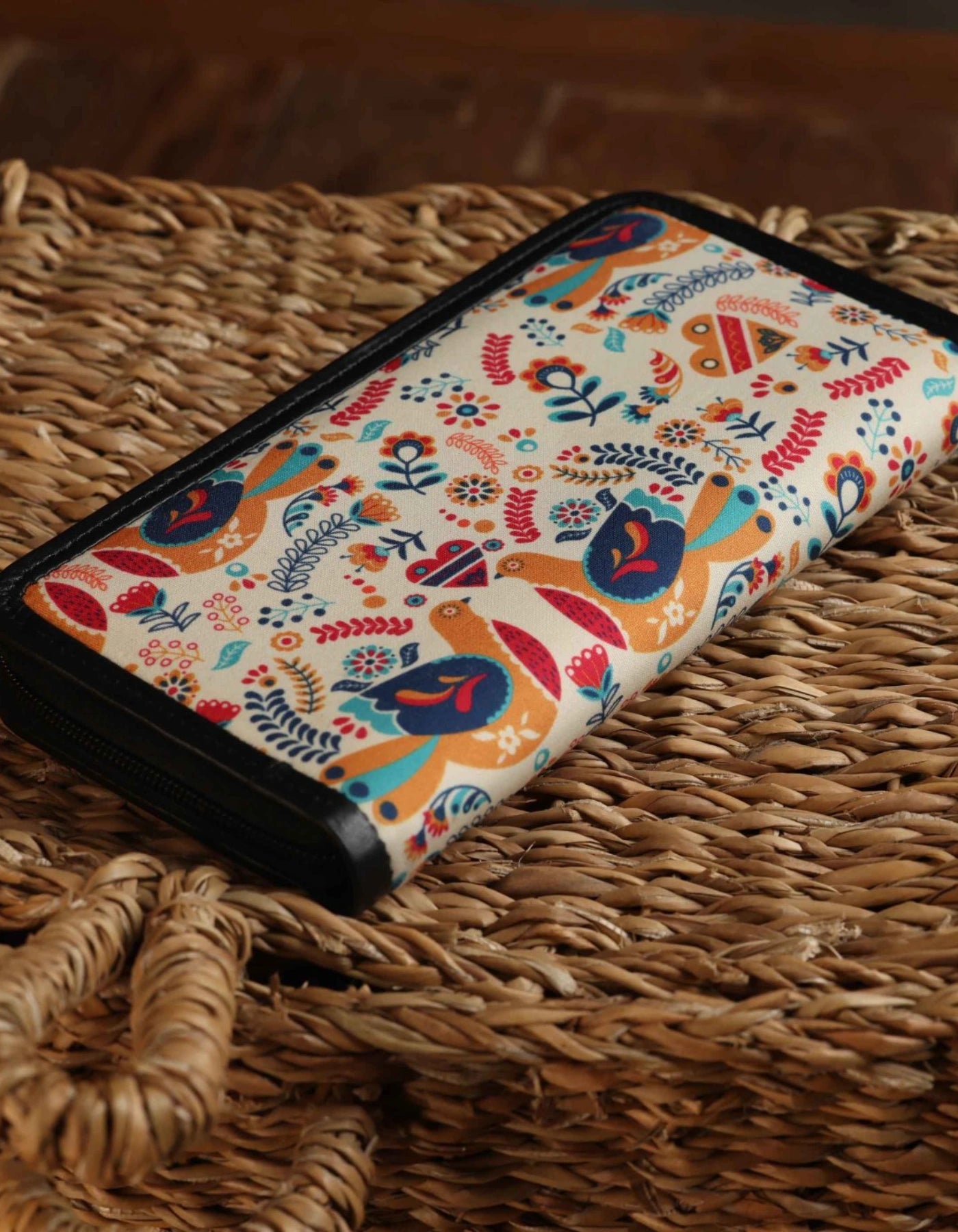 Colorful patterned phone case on a woven surface