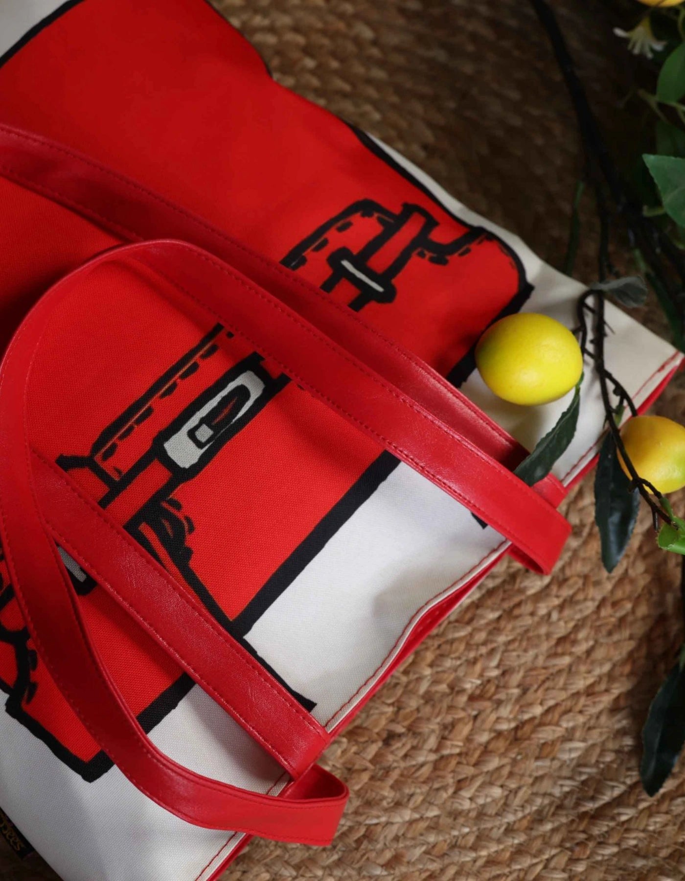 Red bag with black graphics on a textured surface