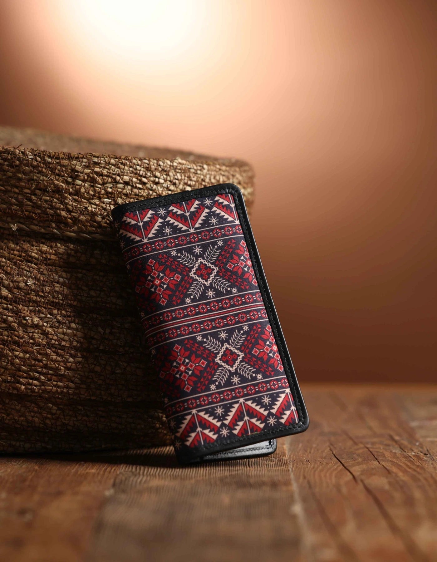 Phone case with tribal pattern on a wooden surface