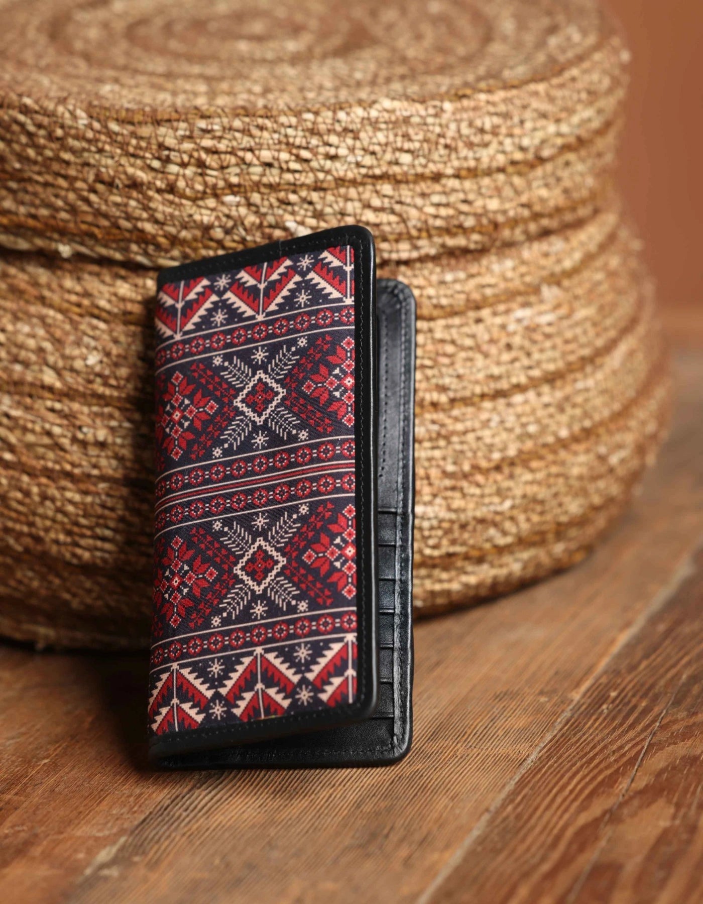 Phone case with geometric pattern on a woven basket background