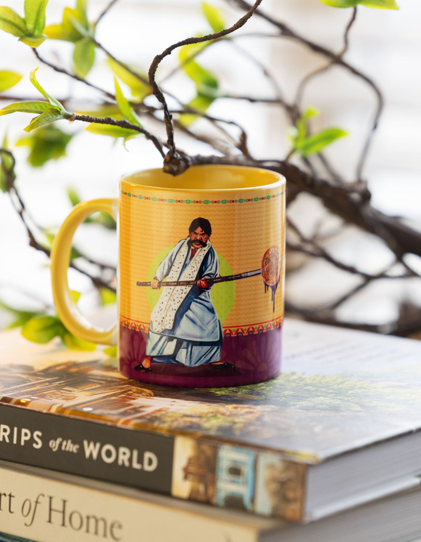maulat jutt design on yellow ceramic cup